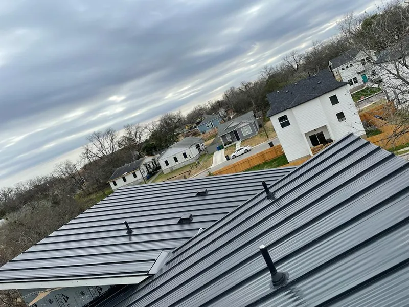 Standing seam metal roof panels with vents for Skylight Repair in Little Elm